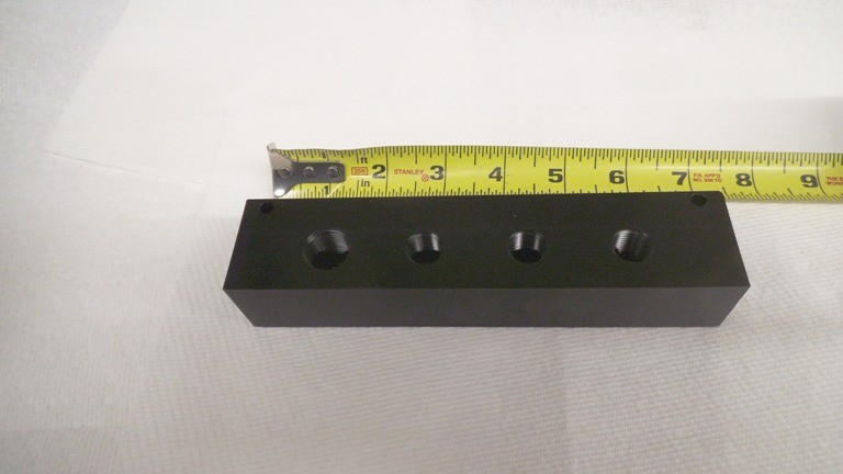 9 port Acetal distribution manifold, 3/8 npt x 1/4 npt, 6-3/4″ x 1-1/2″ x 1-1/4″