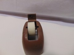 vintage Original solid metal brown manual take dispenser weighs 3 pounds 5″ x 2″