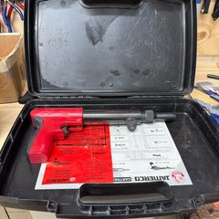 JAMERCO JTB-100 POWDER ACCUATED GUN + EAR PROTECT AND ATTACHMENTS
