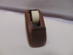 vintage Original solid metal brown manual take dispenser weighs 3 pounds 5″ x 2″