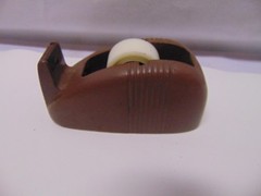 vintage Original solid metal brown manual take dispenser weighs 3 pounds 5″ x 2″